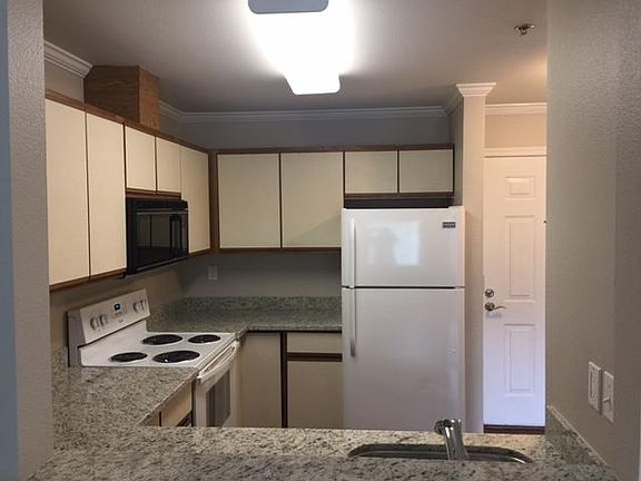 ice maker, outside vented microwave, self cleaning oven