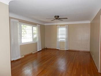 Very spacious living room with shining hardwood floor