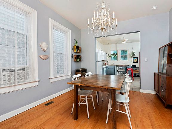 The large formal dining room easily fits a table for 10 - 12 guests with plenty of additional storag