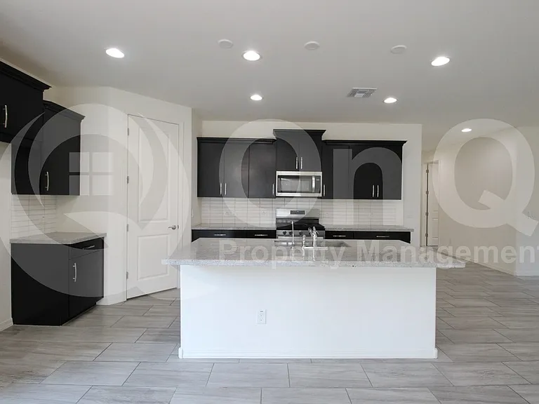 9114 S 167th Dr — Photo 40