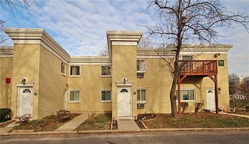 Exterior Front of Building 18: Private entrance door to Unit
