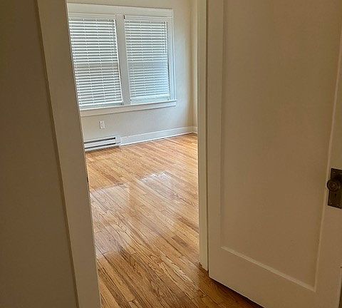 Hall at front bath to first bedroom