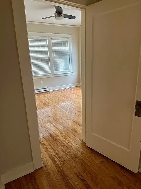 Hall at front bath to first bedroom