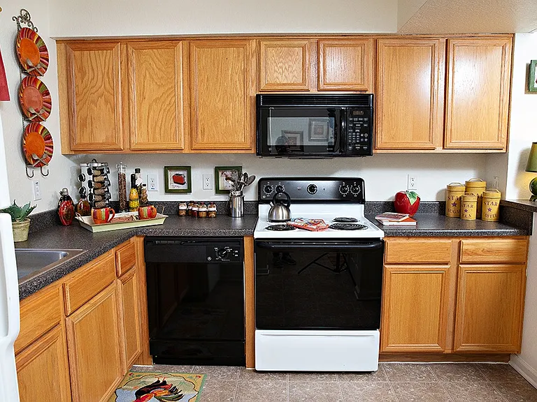 Thoughtfully designed with modern convenience and classic finishes, in this fully equipped kitchen.