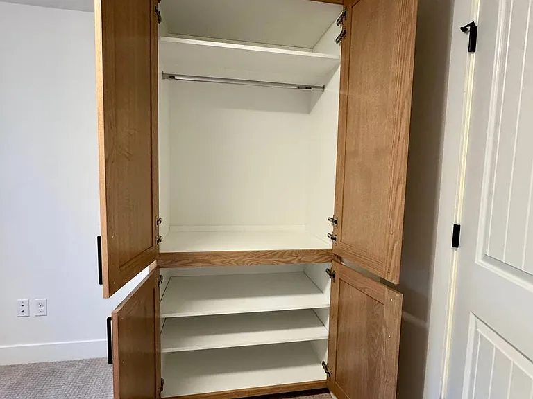 custom cabinetry closet in 2nd bedroom