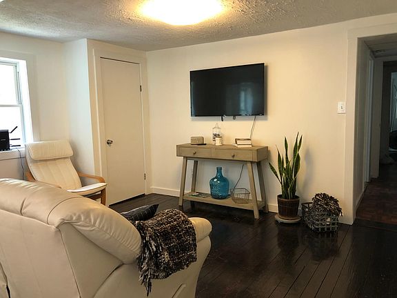 Roku TV. Ikea reading chair. Closet to left of TV.