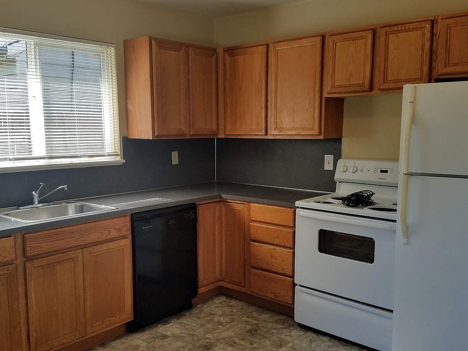 View from back door entrance - kitchen with dishwasher