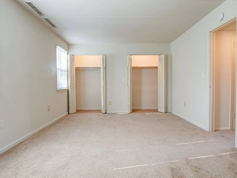 Large bedroom with two large closets with plenty of storage