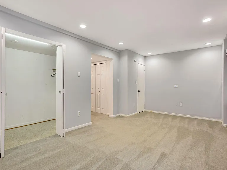 Recreation room in the basement with large closet