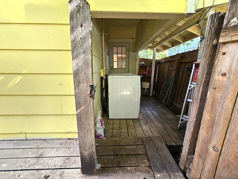 Laundry with additional outside covered storage