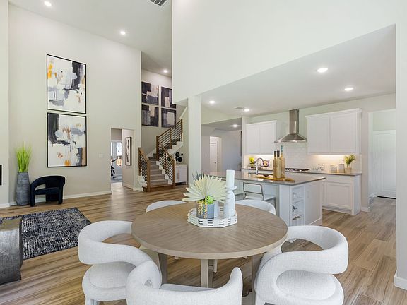 Open first floor in the Morrison II home plan by Trophy Signature Homes - REPRESENTATIVE PHOTO