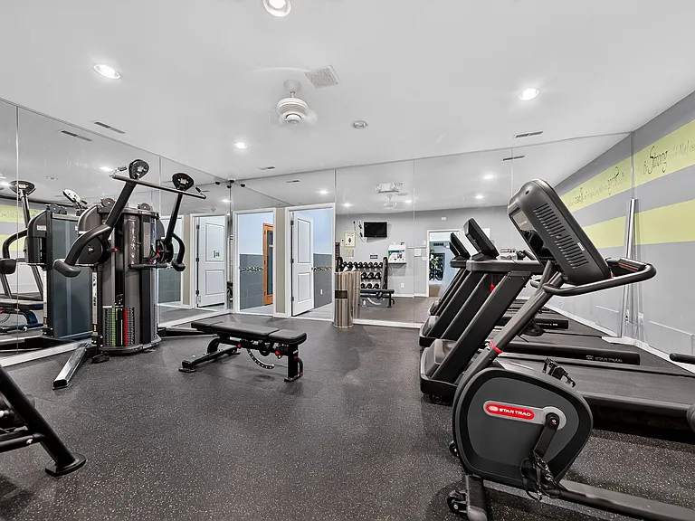 24-hour fitness center and Eastwood Village Apartments in Clinton Township, MI.