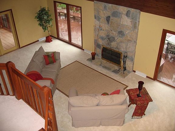 Warm, Open Great Room w/ wood-burning Stone Fireplace