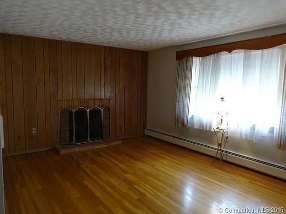 Wood floors throughout this...