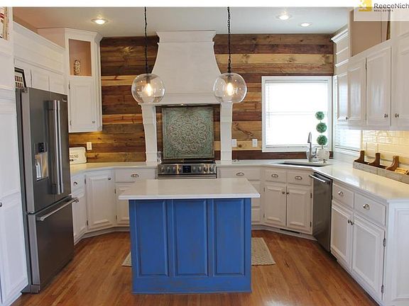 Beautifully updated kitchen with quartz countertops.