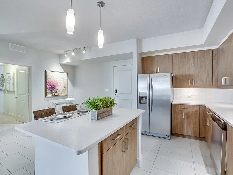 Enjoy the tiled back splashes and under cabinet lighting