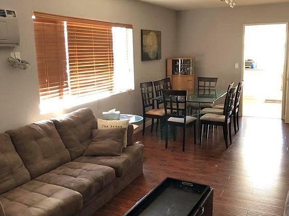 Sun-lit, spacious living room and dining room areas.