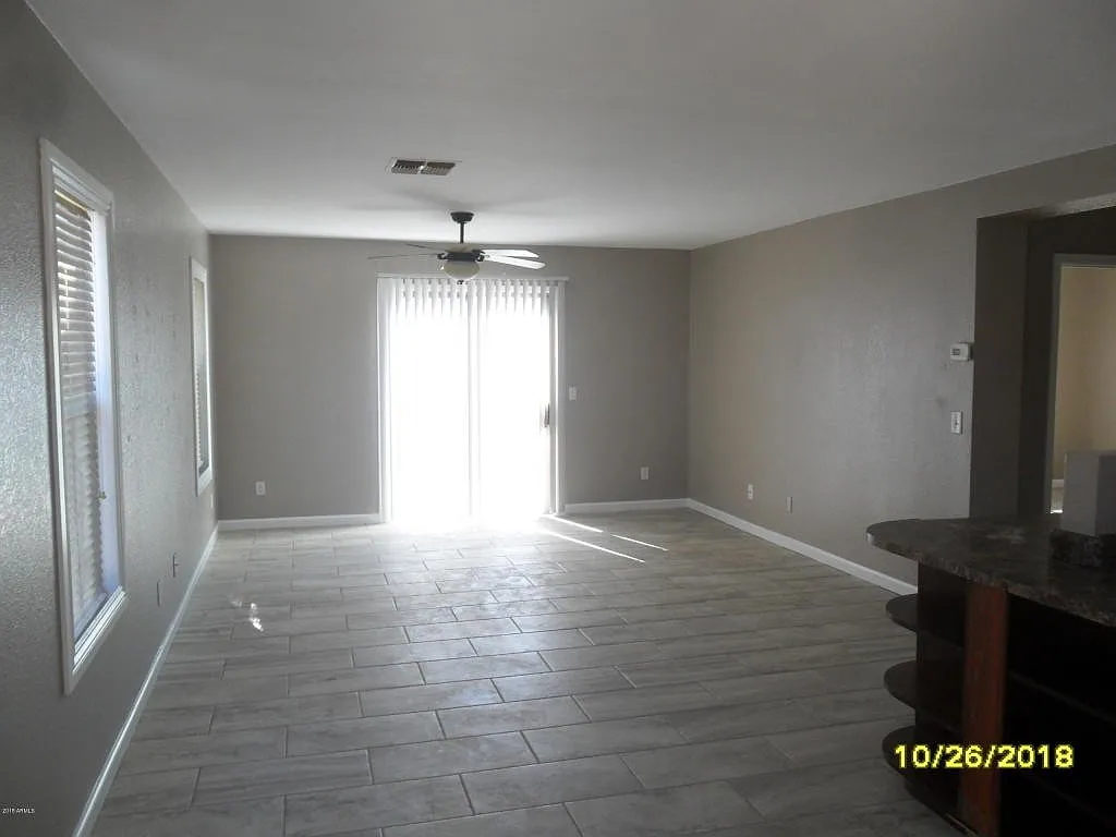 El Mirage Home with Tile Flooring Throughout — Photo 2