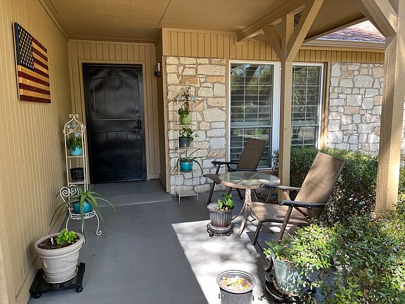 front patio
house is lime stone and wood