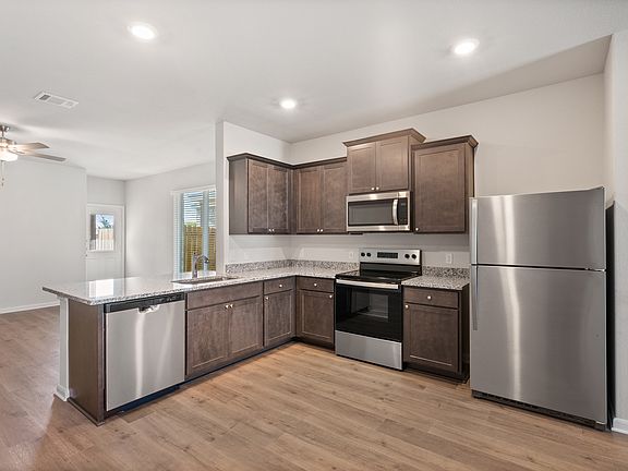 The kitchen has energy-efficient appliances.