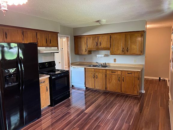 Kitchen with laundry room behind