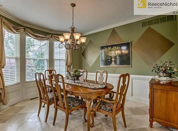 Dining Room with fantastic natural Travertine Stone Tile work, W