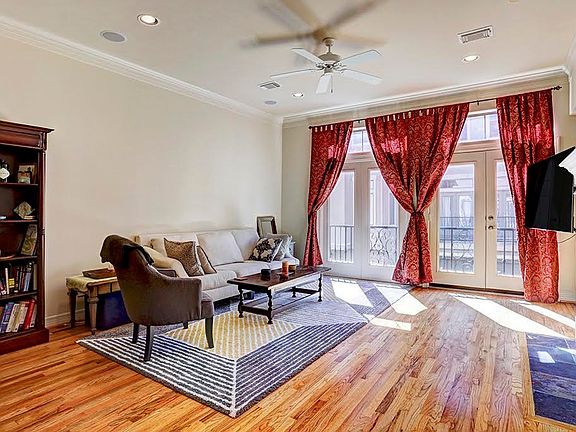 This is the spacious Living Room that leads you out on to the Balcony.
