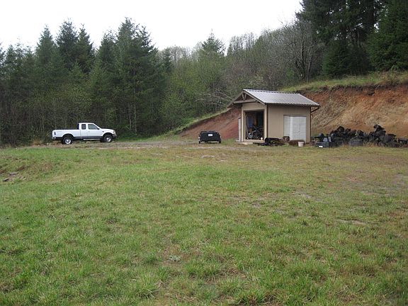 Custom shed w/rollup door