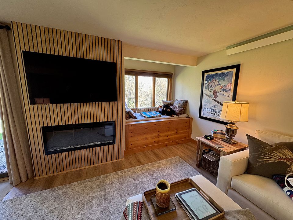 55" Smart OLED TV and electric flame heater, daybed
