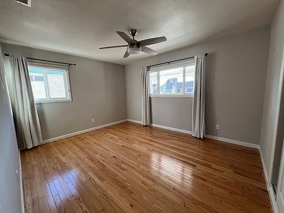 Primary bedroom with ceiling fan