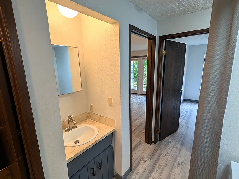 Extra sink across from bedroom and laundry area.