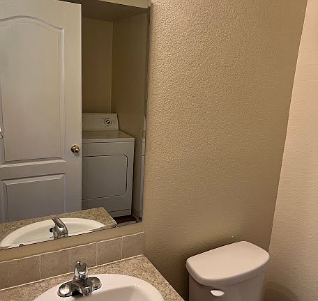 HALF BATH WITH WASHER AND DRYER