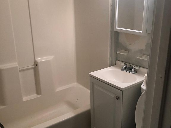 New toilet, vanity and lighting and mirror