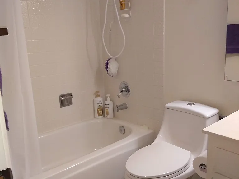 Front bathroom is across from the 2nd bedroom.