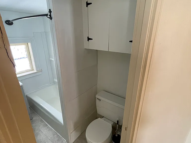 Cabinetry and storage in bathroom.