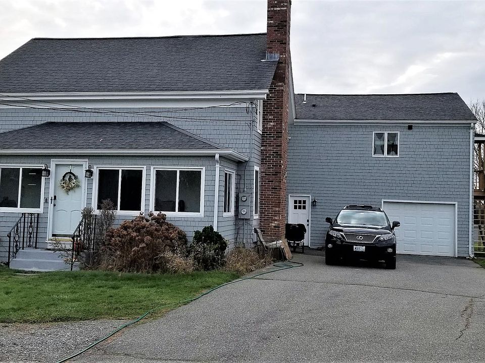 street view, apartment is up steps over the garage