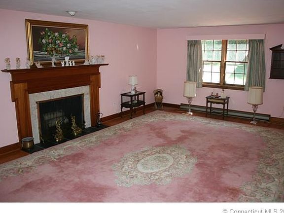 FORMAL LIVING ROOM WITH FIR...