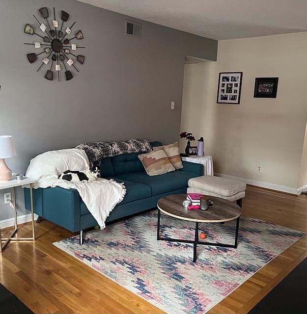 Living area facing fireplace