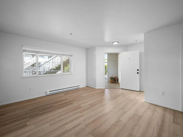 Experience the warmth and openness of this inviting living space, perfect for relaxation.