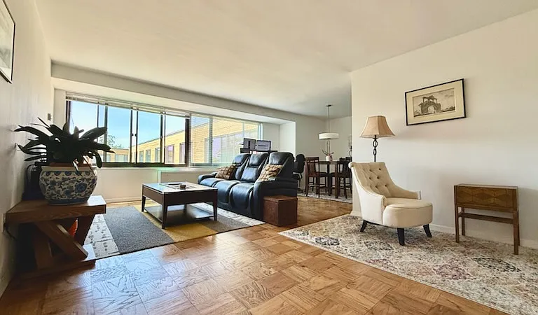 Slightly different view of reading nook, living room, and dining room