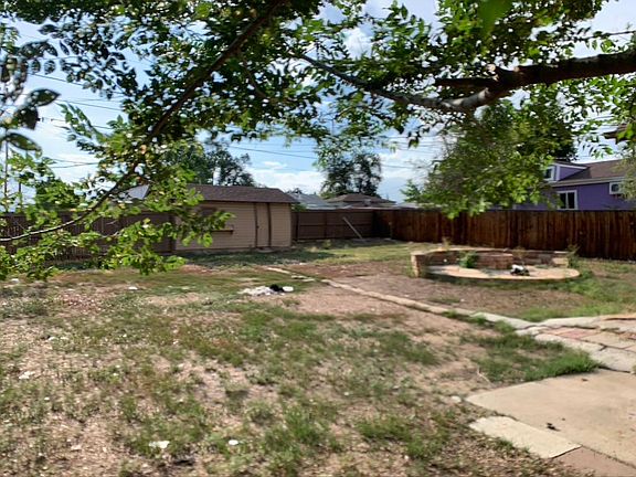 Large back yard with fire pit