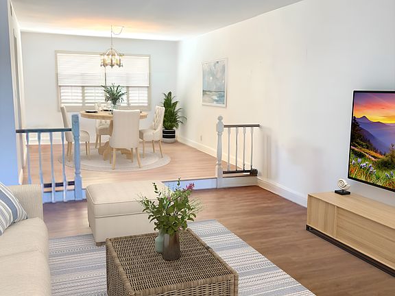 Dining Room off of Living Room. (virtually staged)