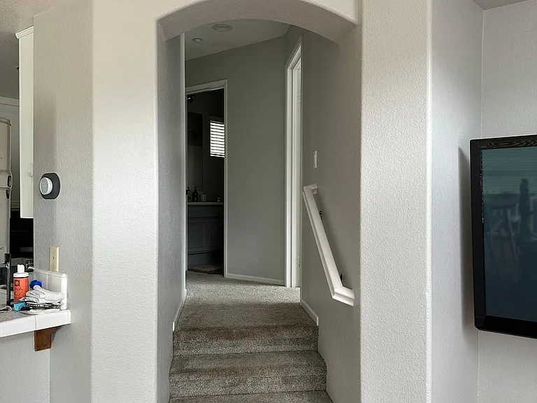 Stairway to the bedroom and bathroom on the main floor
