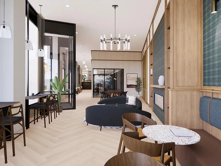 Thoughtfully designed gathering spaces with flexible seating, integrated work areas, and inviting finishes.