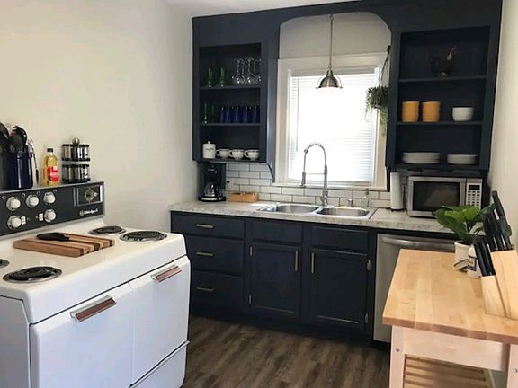 Fully equiped kitchen including pots, pans, dishes and silverware