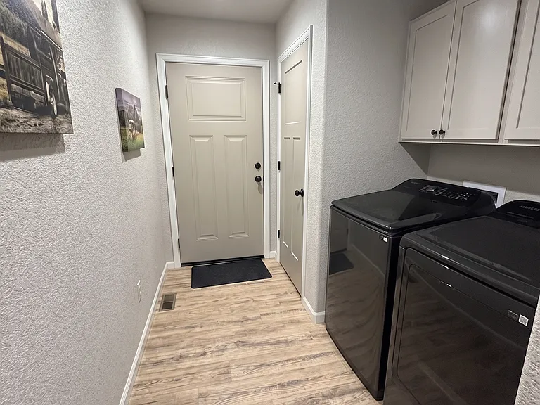 Entry from garage & Laundry hook up