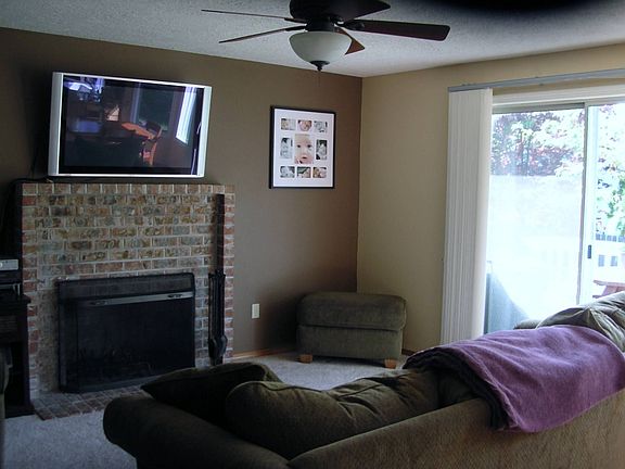 Family room w/ wood fireplace