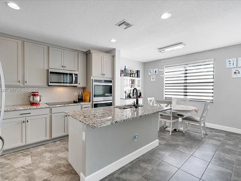 3392 NW 5th St — Photo 10