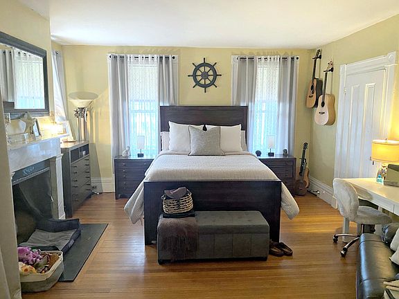 Bedroom is open to living room. Pocket doors (not pictured) can be shut to close off bedroom.
