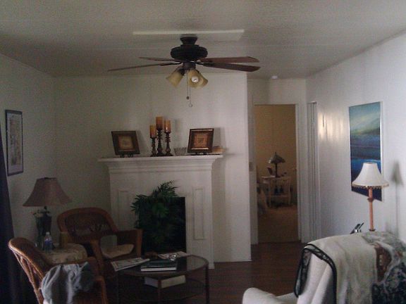 sitting area with new flooring through out house